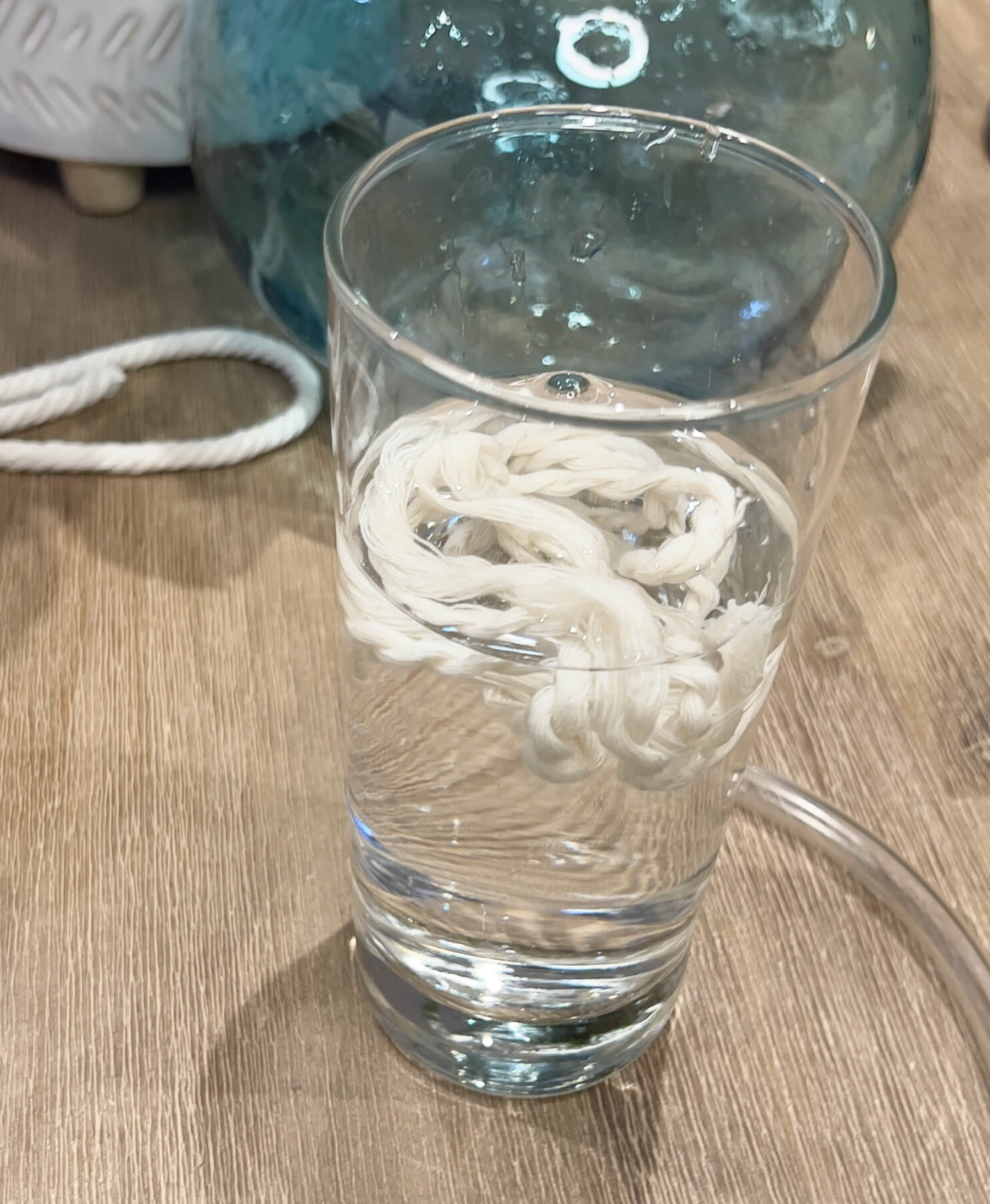 wet your cotton cord in water for plant straw